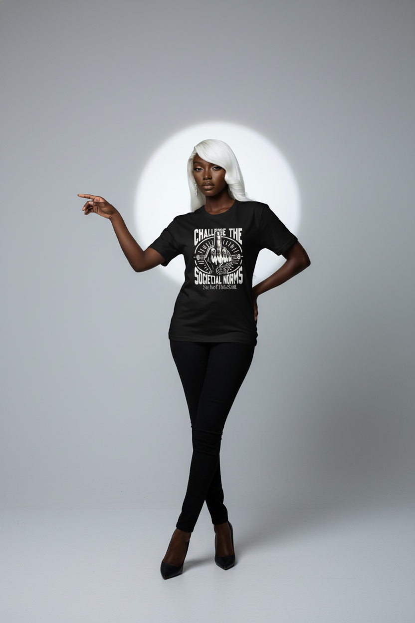 Woman wearing black "Challenge the Societal Norms" T-shirt with bold raised middle finger design, standing confidently against gray background