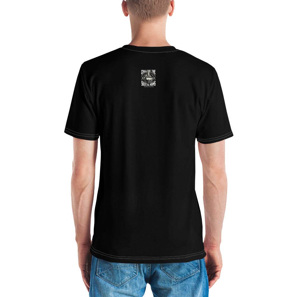Back view of black "Challenge the Societal Norms" T-shirt with small graphic on upper back, worn by model with blue jeans.