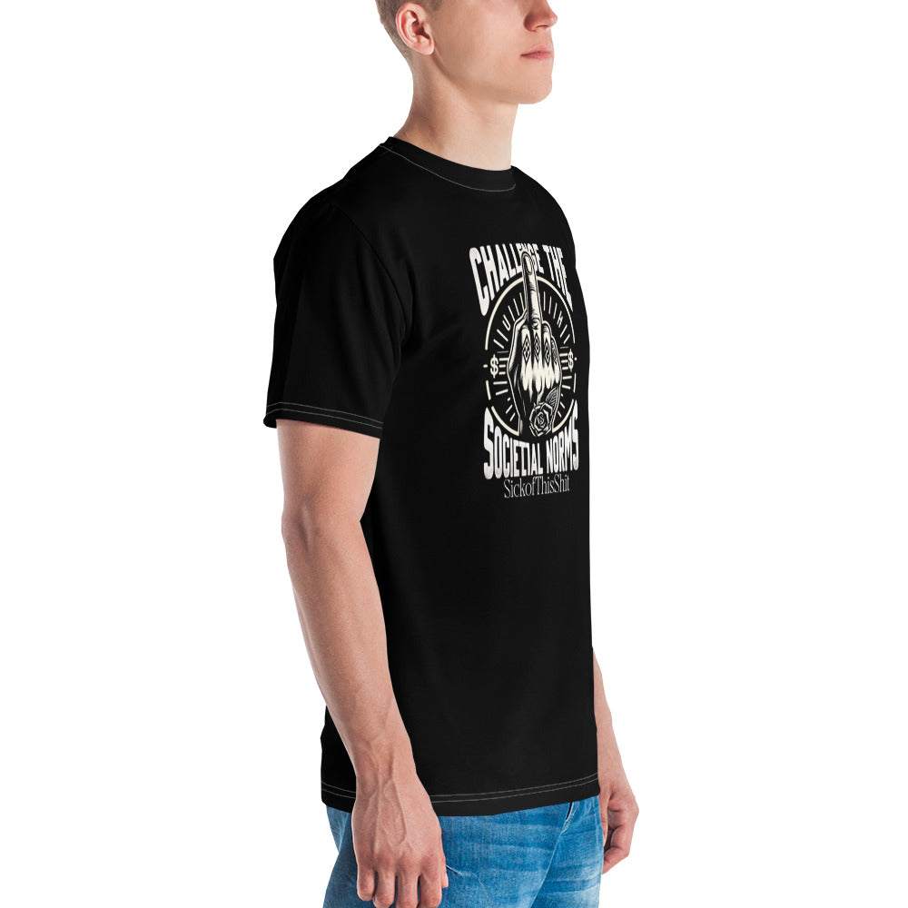 Black "Challenge the Societal Norms" t-shirt with raised middle finger graphic, worn by a male model in blue jeans, casual fit.