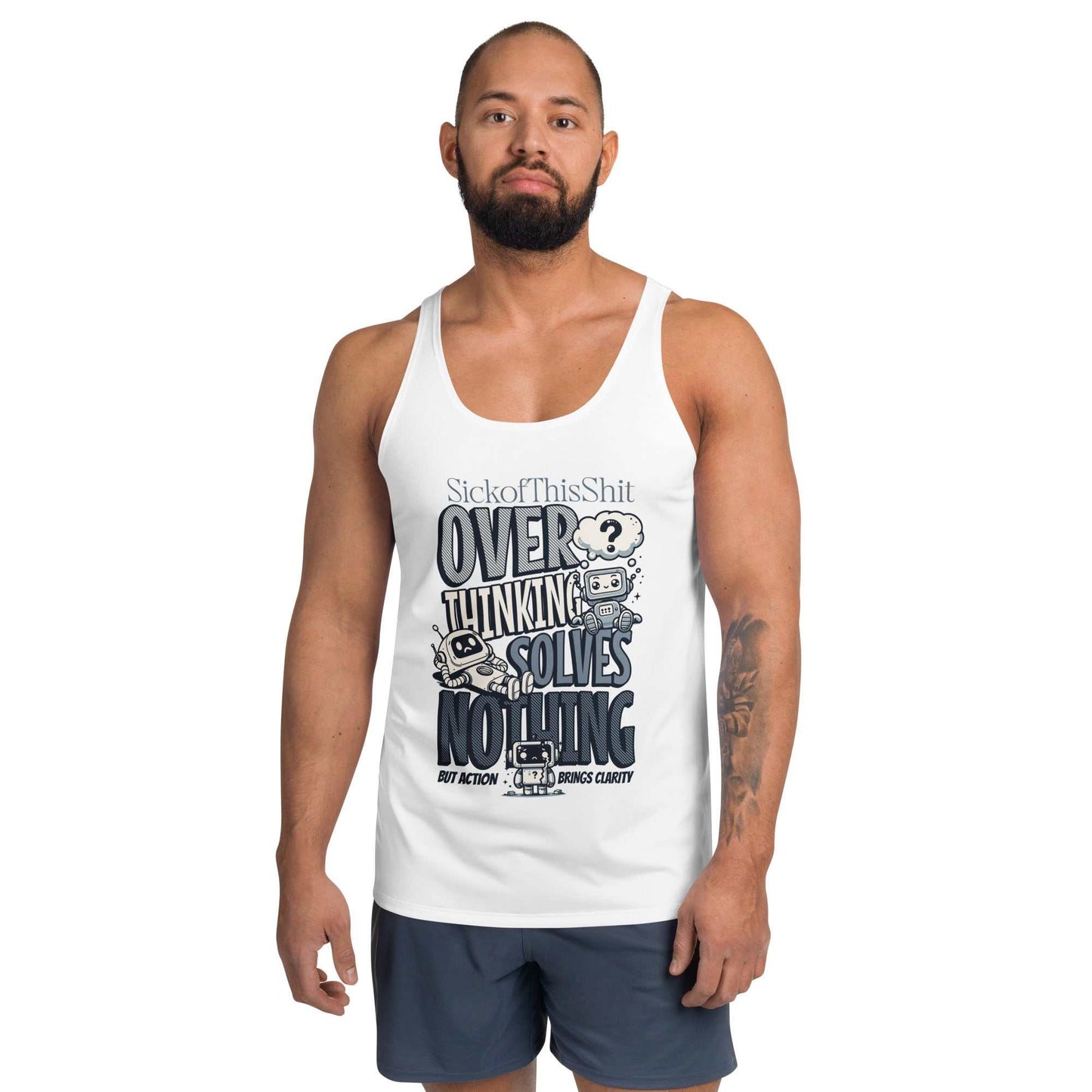 Man wearing white "Take Action Tank Top" with "Overthinking Solves Nothing" graphic and text, paired with dark shorts