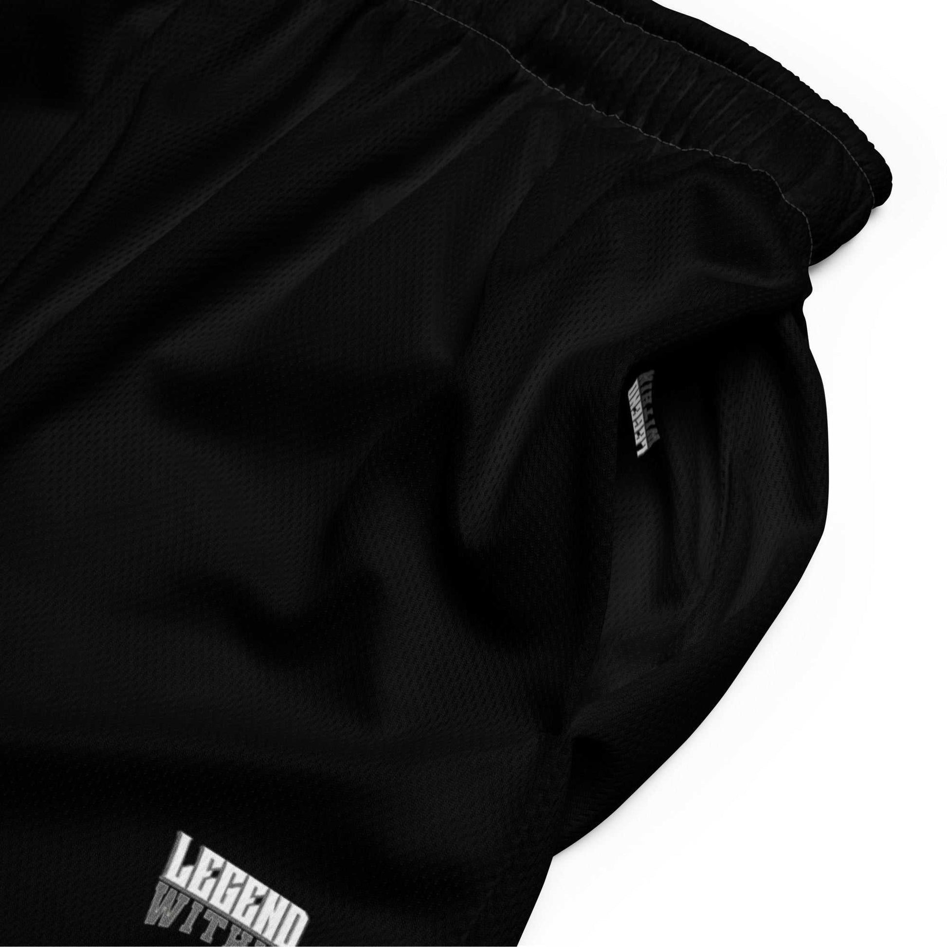 Black LegendWithin mesh shorts with elastic waistband and moisture-wicking recycled polyester fabric