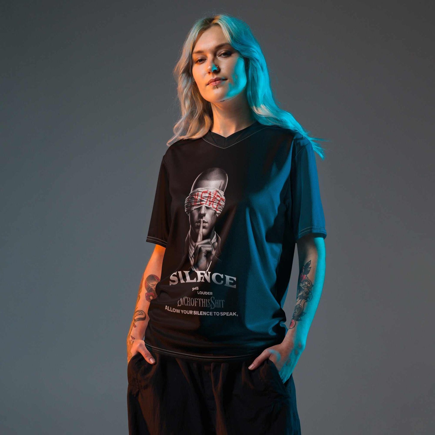 Woman wearing SickofthisShit Silence unisex sports jersey with graphic of person blindfolded and text promoting silent confidence