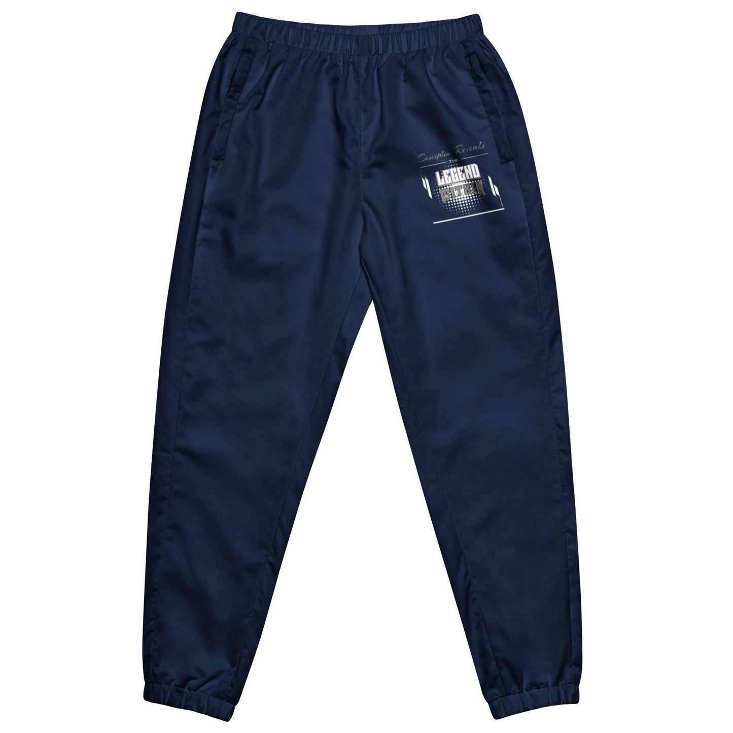 LegendWithin track pants in navy blue with elastic waistband and ankle cuffs, zip pockets, lightweight water-resistant fabric, and mesh lining.