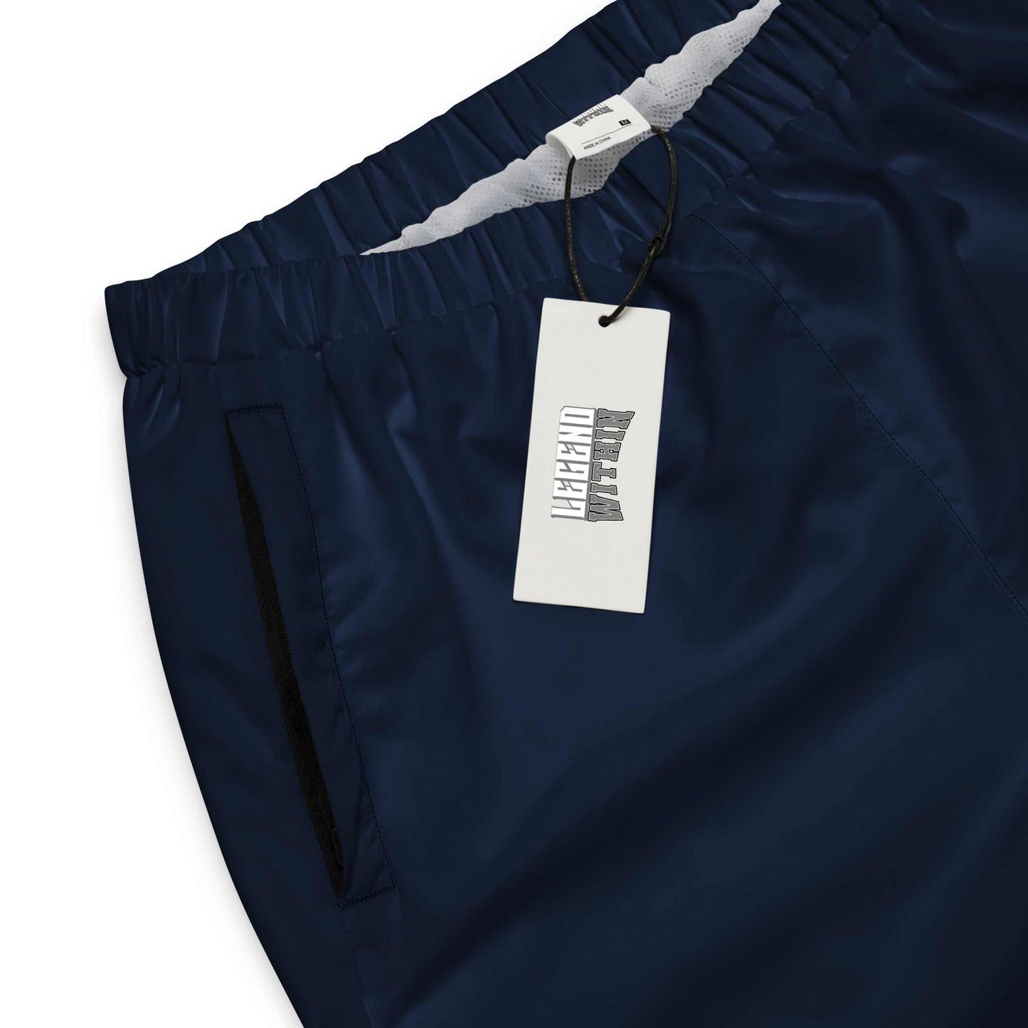 LegendWithin navy blue unisex lightweight water-resistant track pants with elastic waistband and zip pockets
