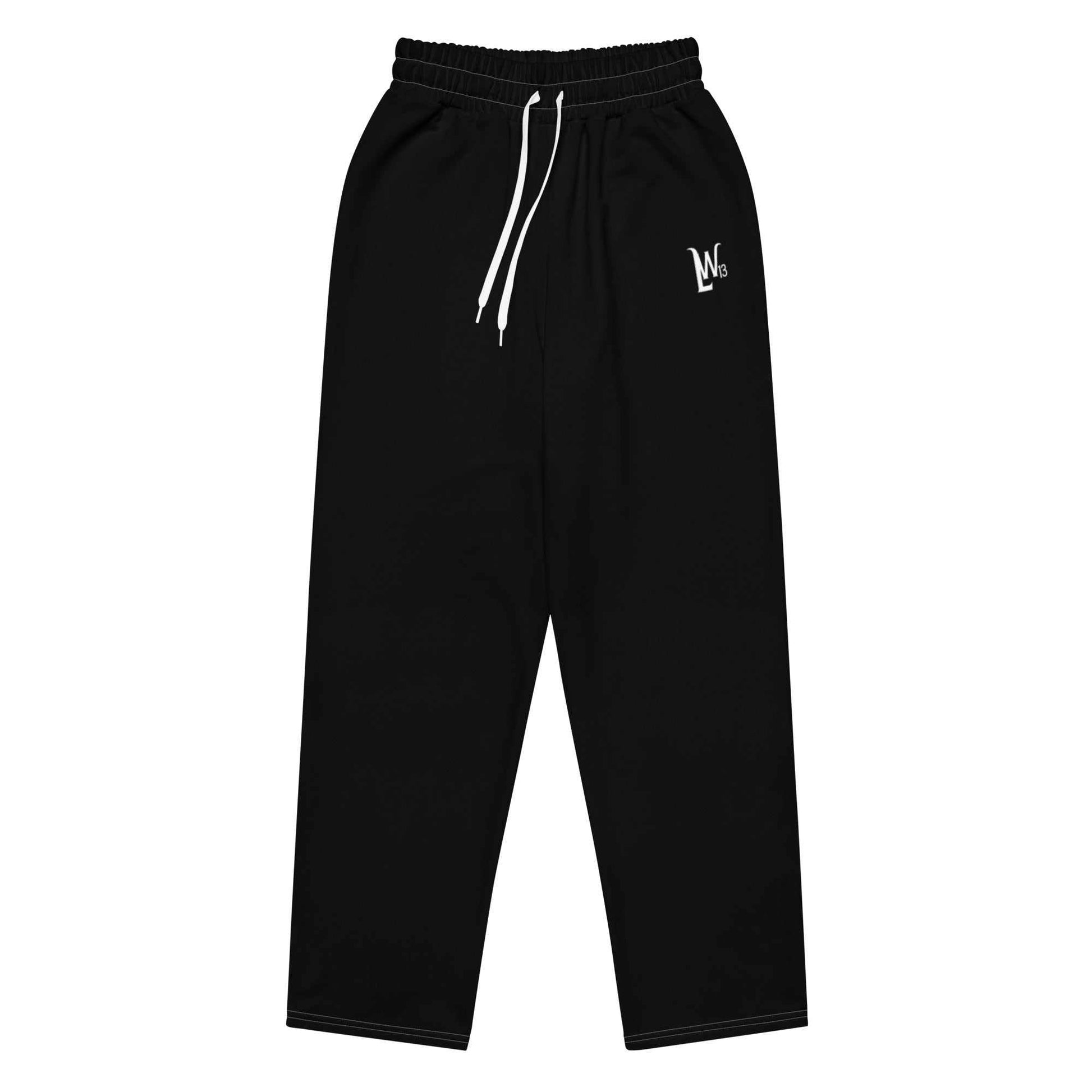 Black wide-leg joggers with elastic waistband and drawstring, featuring side pockets and a relaxed fit.
